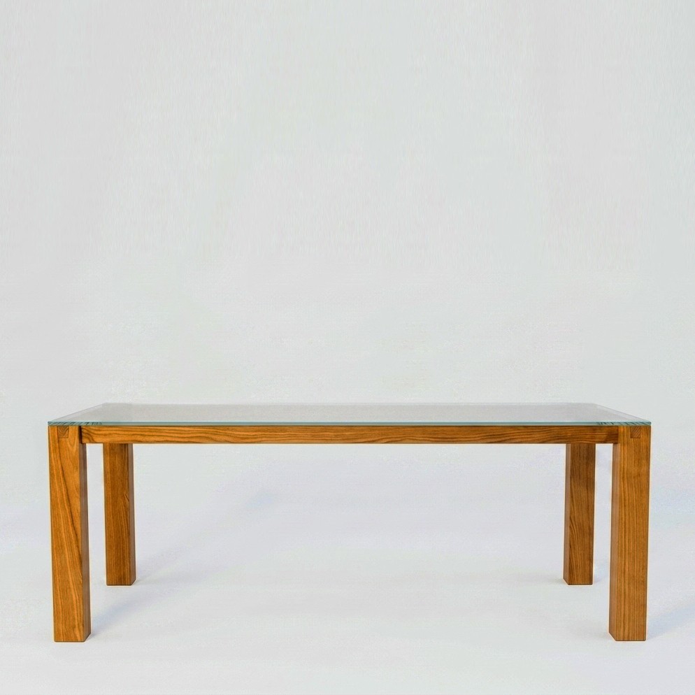 Travi, tavolo smontabile in legno massello con piano in cristallo, design Alessandro Marelli